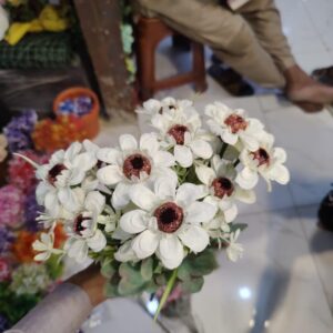 Artificial simulated chamomile flowers.